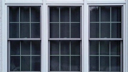 Professional Home Improvements finished window installation showing a clear view.